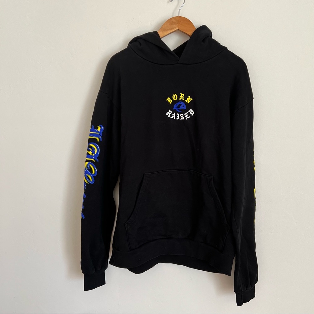 LA Rams Born x Raised Black Airbrushed Rampage Pullover Hoodie - Picture 2 of 9